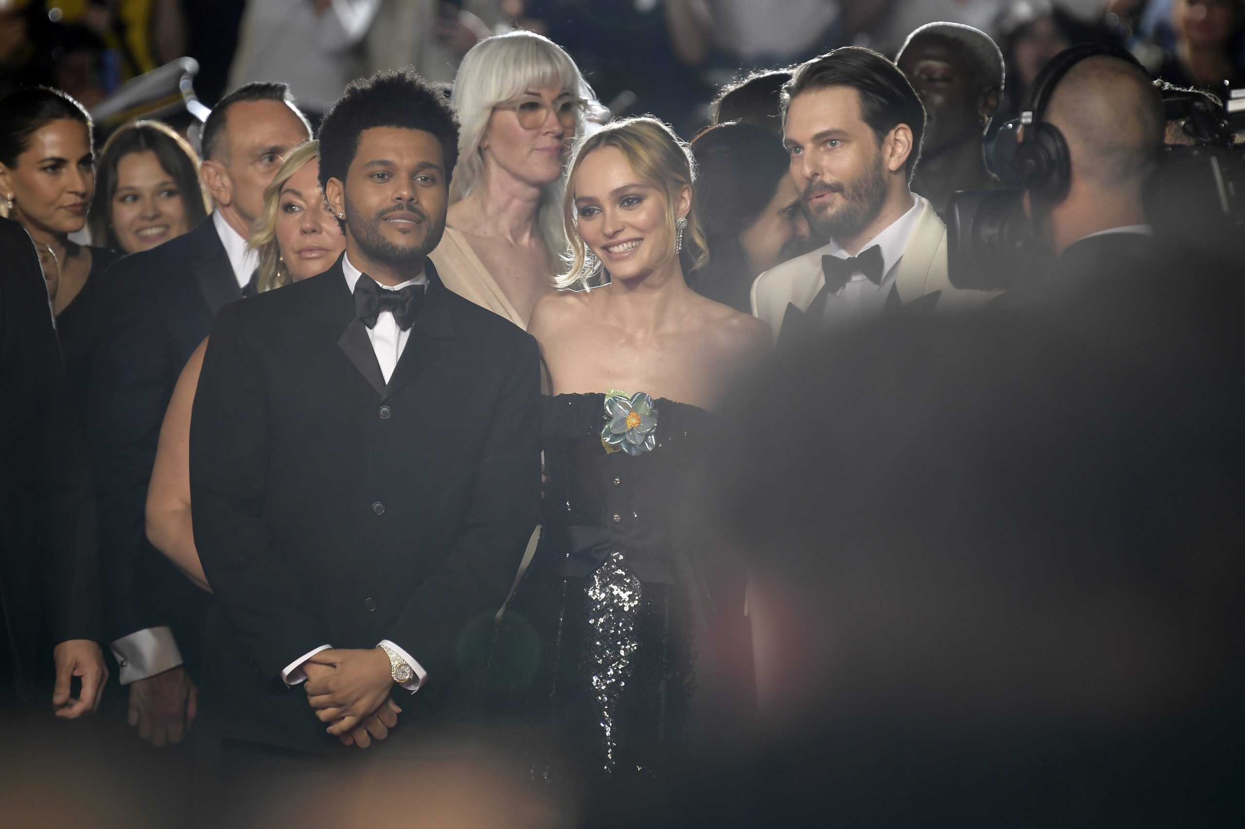 CANNES, FRANCE - MAY 22: (L-R) Abel “The Weeknd” Tesfaye, Lily-Rose Depp and Sam Levinson attend the "The Idol" red carpet during the 76th annual Cannes film festival at Palais des Festivals on May 22, 2023 in Cannes, France. (Photo by Kristy Sparow/Getty Images)