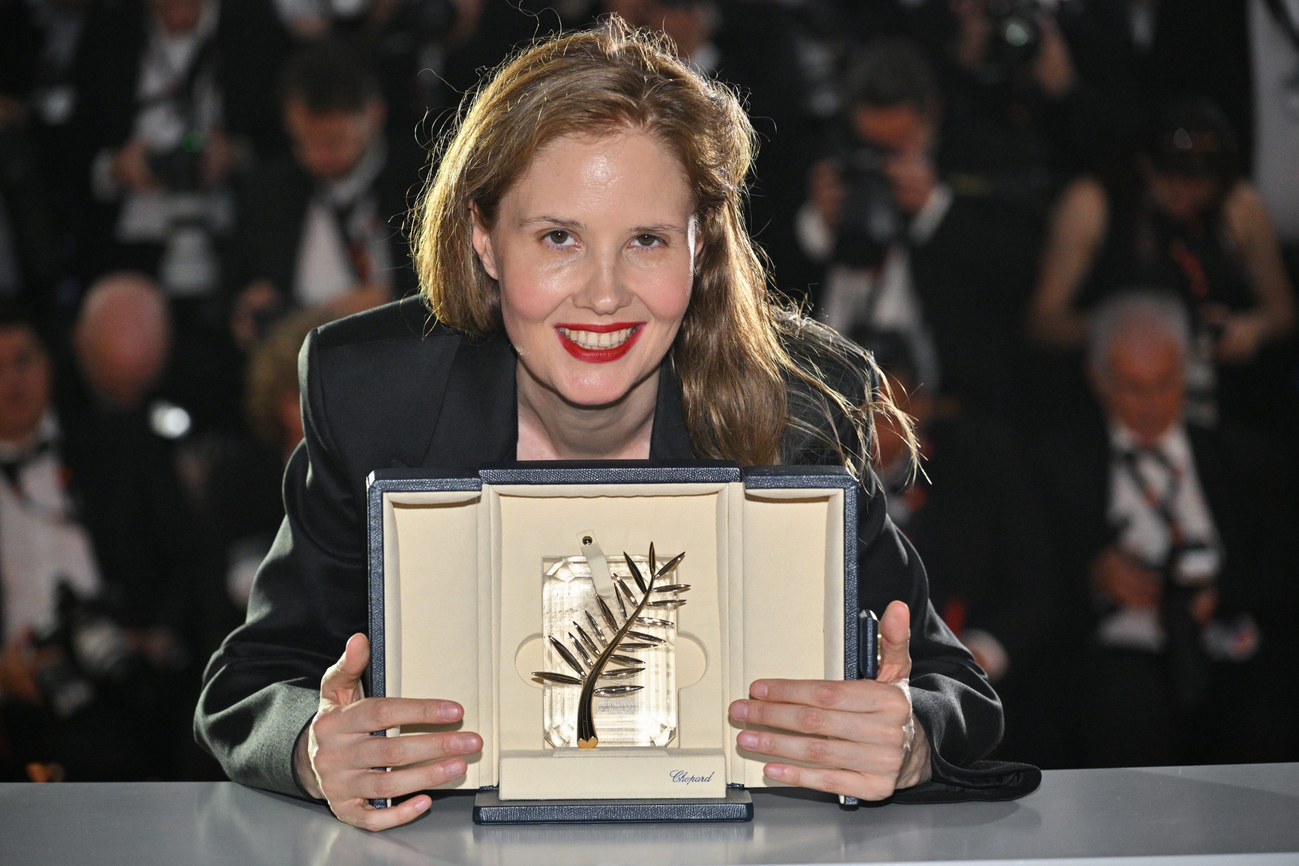 CANNES, FRANCE - MAY 27: Justine Triet poses with The Palme D'Or Award for 'Anatomy of a Fall' during the Palme D'Or winners photocall at the 76th annual Cannes film festival at Palais des Festivals on May 27, 2023 in Cannes, France. (Photo by Stephane Cardinale - Corbis/Corbis via Getty Images)