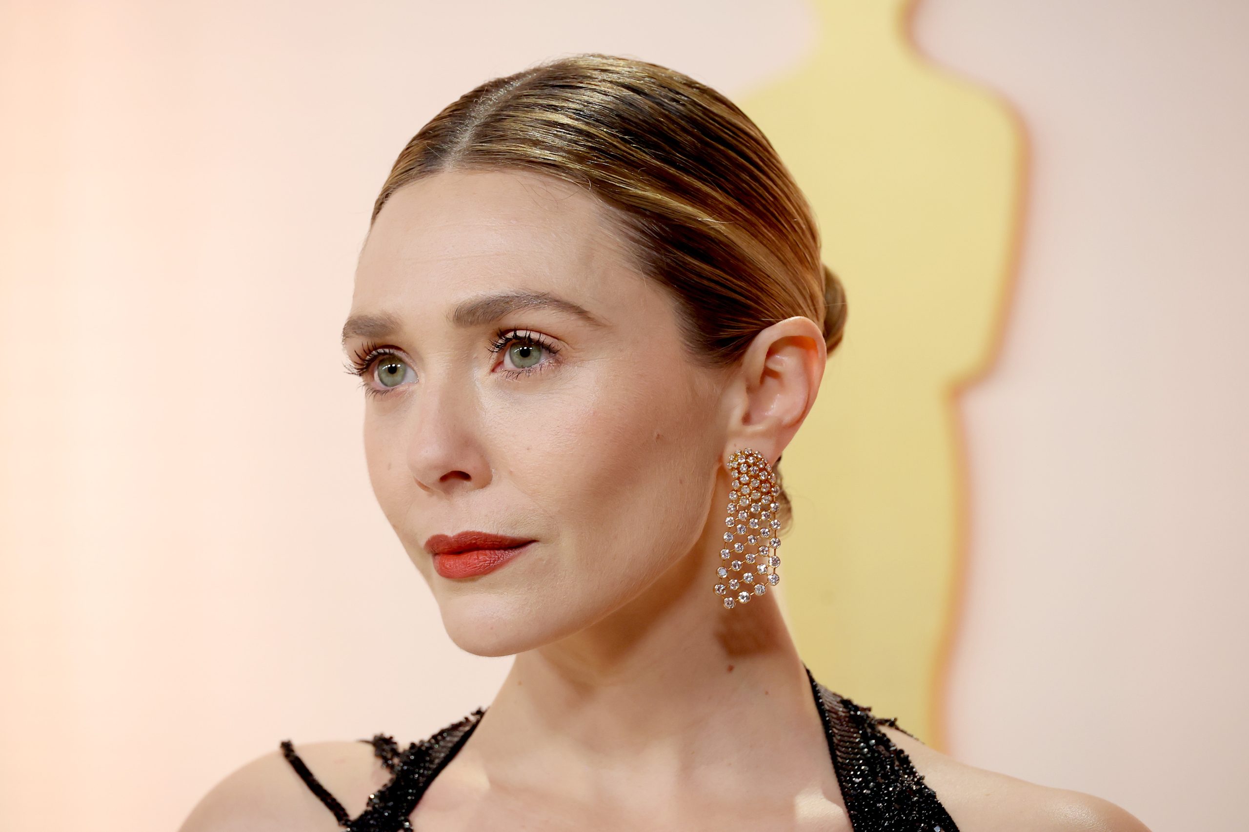 HOLLYWOOD, CALIFORNIA - MARCH 12: Elizabeth Olsen attends the 95th Annual Academy Awards on March 12, 2023 in Hollywood, California. (Photo by Mike Coppola/Getty Images)
