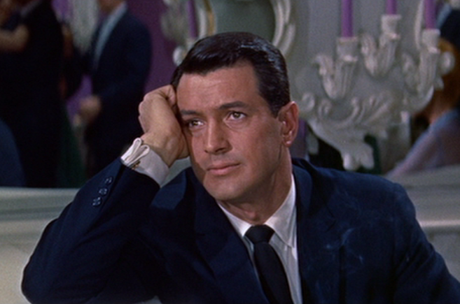 Rock Hudson discovering the other end of his party line for the first time in "Pillow Talk"