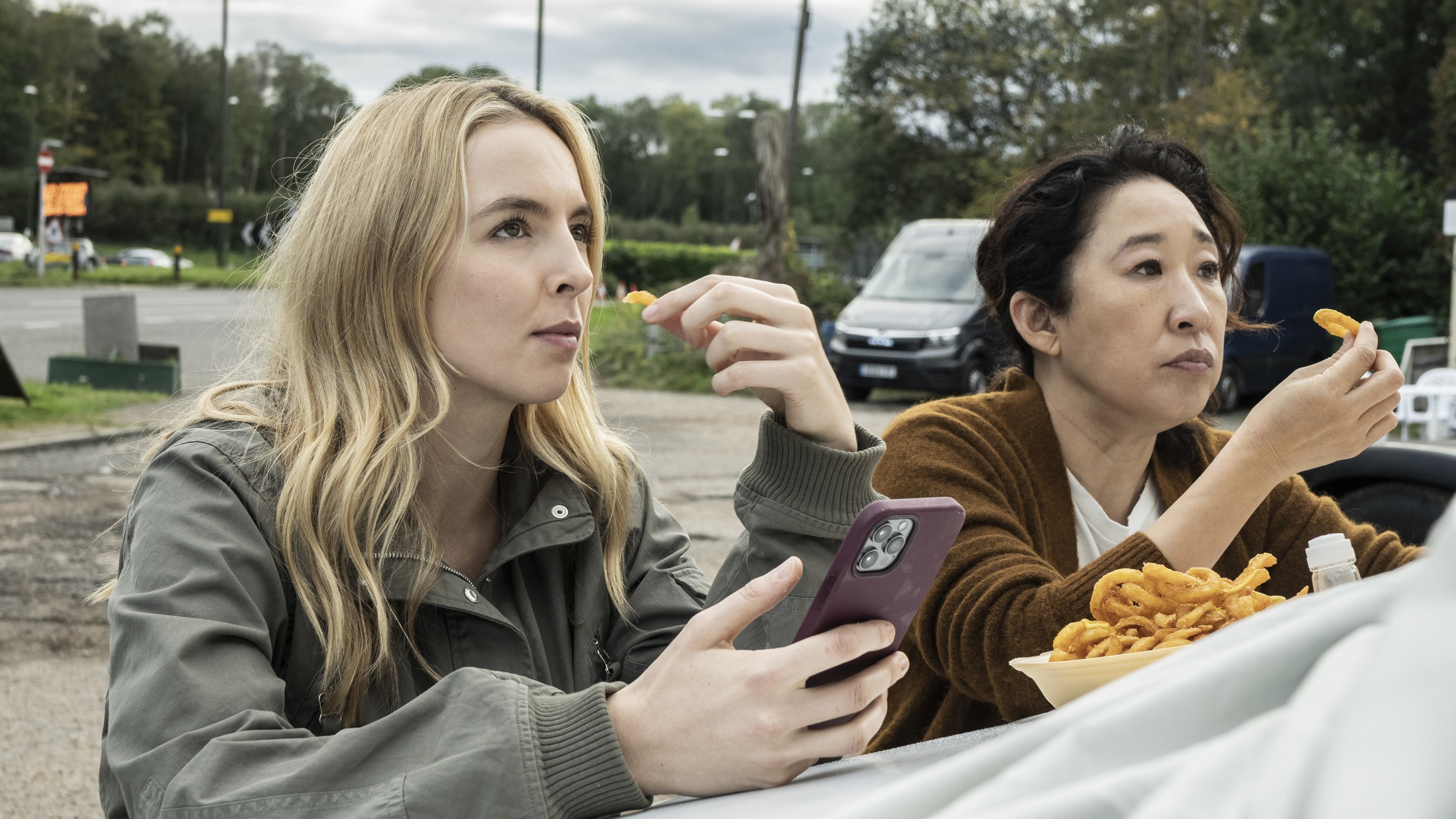 KILLING EVE, from left: Jodie Comer, Sandra Oh, Hello, Losers', (Season 4, ep. 408, aired Apr. 11, 2022). photo: David Emery / ©BBC-America / Courtesy Everett Collection